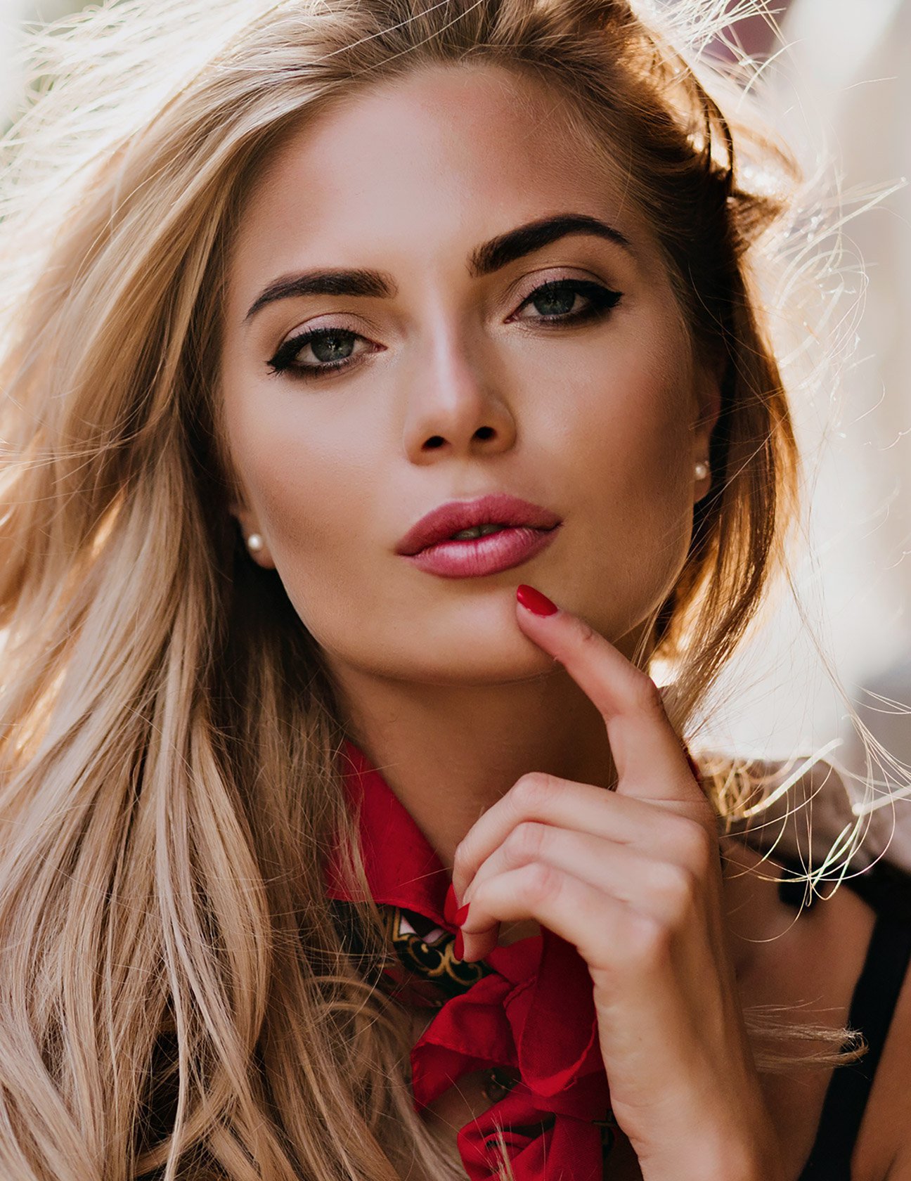 Orange County neck lift model with blonde hair